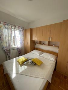 Posteľ alebo postele v izbe v ubytovaní Apartmani Mario Biograd na Moru + 25 fotografií