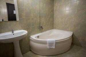 Koupelna v ubytování Pensiunea Dacia Deva + 33 fotografií