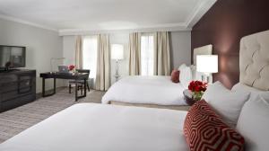 Ein Bett oder Betten in einem Zimmer der Unterkunft The Graham Georgetown