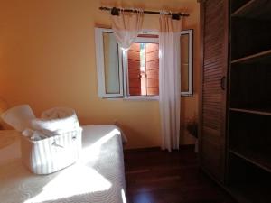 Posteľ alebo postele v izbe v ubytovaní Merlo House Dol Hvar