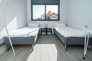 Posteľ alebo postele v izbe v ubytovaní LMT46 - Modern Style Spacious Townhouse