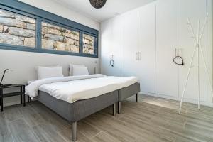 Posteľ alebo postele v izbe v ubytovaní LMT46 - Modern Style Spacious Townhouse