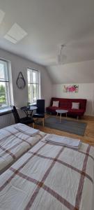 Postel nebo postele na pokoji v ubytování Korsør Room