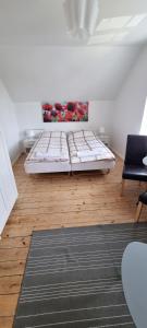 Postel nebo postele na pokoji v ubytování Korsør Room