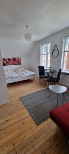 Postel nebo postele na pokoji v ubytování Korsør Room