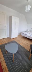 Postel nebo postele na pokoji v ubytování Korsør Room