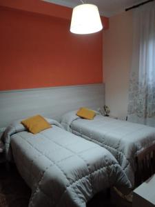 Postel nebo postele na pokoji v ubytování Albergo Maria Cristina