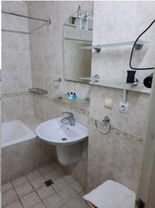 Ванна кімната в APARTAMENT AXUNDOV BAGI