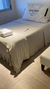 Ein Bett oder Betten in einem Zimmer der Unterkunft DEPARTAMENTO NUEVO CENTRICO 2 DORMITORIOS 2 Baños COCHERA-PISCINA