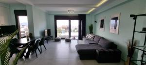 Posezení v ubytování Sandy Cozy Apartments