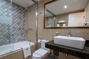 Koupelna v ubytování Hotel Rojas Inn