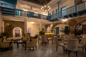 Posezení v ubytování Hotel Rojas Inn
