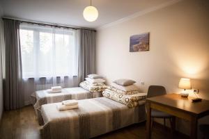 Ein Bett oder Betten in einem Zimmer der Unterkunft DW Halicz