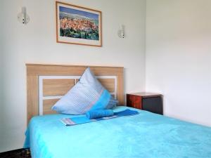 Posteľ alebo postele v izbe v ubytovaní Villa Aquamarina 600 m vom Meer, Casa in Miami Platja, Ferienhaus mit Garten, WLAN, Garage, Terrasse, Grill