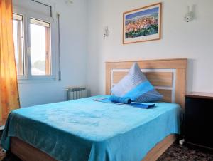 Posteľ alebo postele v izbe v ubytovaní Villa Aquamarina 600 m vom Meer, Casa in Miami Platja, Ferienhaus mit Garten, WLAN, Garage, Terrasse, Grill