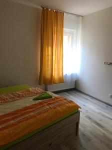 Posteľ alebo postele v izbe v ubytovaní Apartment an der Burg