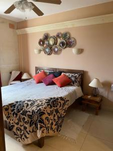 Tempat tidur dalam kamar di Ta’ Giljan B&B Gozo