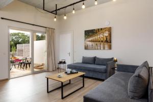 Uma área de estar em Senses Suites