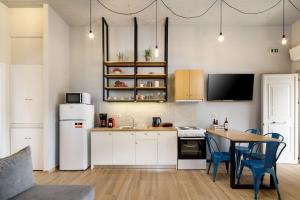 A cozinha ou kitchenette de Senses Suites