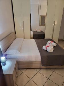 Posteľ alebo postele v izbe v ubytovaní Fiumicino beach