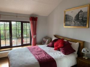 Postel nebo postele na pokoji v ubytování Beech Lodge B&B