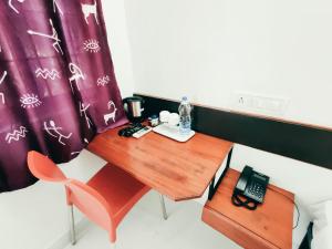 Posezení v ubytování Raccoon Rooms