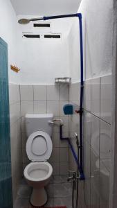 ห้องน้ำของ Taun Gusi Village Homestay