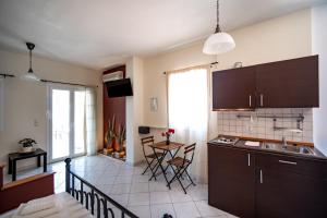 Kuchyň nebo kuchyňský kout v ubytování Philyra appartments