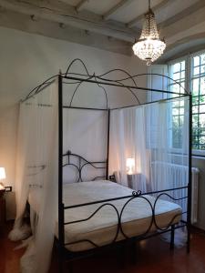 Posteľ alebo postele v izbe v ubytovaní Villa Al Ponte