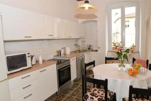 Kuchyň nebo kuchyňský kout v ubytování Apartment Škunca