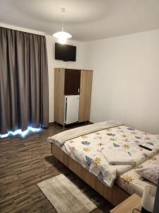 Postel nebo postele na pokoji v ubytování Casa Inna Venus