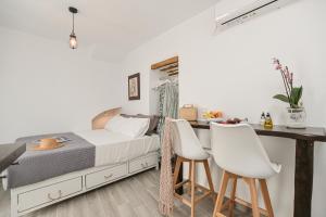 Postel nebo postele na pokoji v ubytování Venetian Suites III