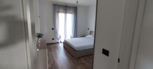 Posteľ alebo postele v izbe v ubytovaní La casa del sole (arcomagno San Nicola Arcella)