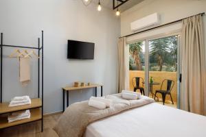 Uma cama ou camas num quarto em Senses Suites
