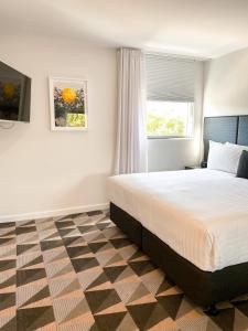 The Gem Hotel客房内的一张或多张床位