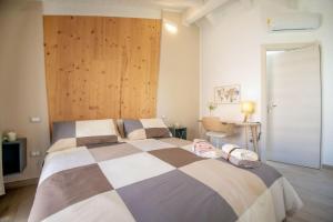 Postel nebo postele na pokoji v ubytování B&B Le Casette Chieti