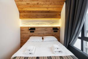 Voodi või voodid majutusasutuse Baza Smart Hotel toas