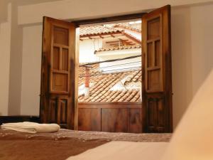 Katil atau katil-katil dalam bilik di Hotel Montecristo Cusco