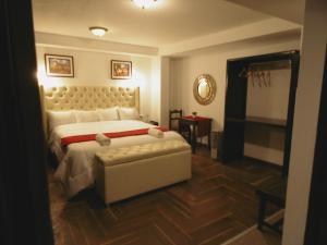 Katil atau katil-katil dalam bilik di Hotel Montecristo Cusco