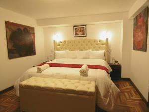 Katil atau katil-katil dalam bilik di Hotel Montecristo Cusco