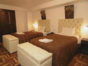 Katil atau katil-katil dalam bilik di Hotel Montecristo Cusco