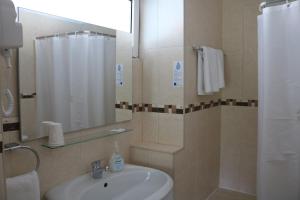 Ett badrum på Hotel Solar das Laranjeiras