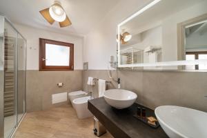 Koupelna v ubytování I Ginepri Hotel