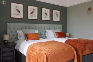 Кровать или кровати в номере Sentry Mead Hotel