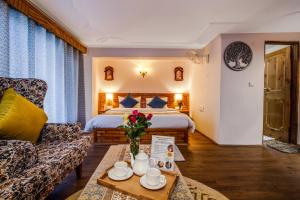 Postel nebo postele na pokoji v ubytování mary's cottages + 37 fotografií