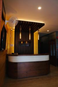 a lobby with a large organ in a building at Igloo Heritage Resorts in Idukki