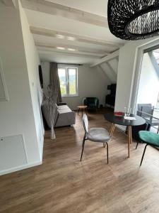 Χώρος καθιστικού στο Neues Ferienhaus +5 φωτογραφίες