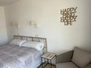 Postel nebo postele na pokoji v ubytování Hostal Roberto