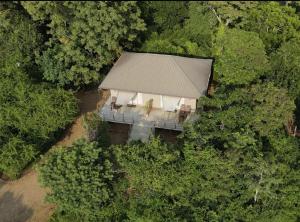 an overhead view of a house in the forest at Kele Yala in Yala