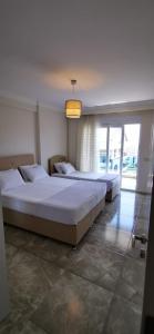 Postel nebo postele na pokoji v ubytování Luxury Residence Alanya